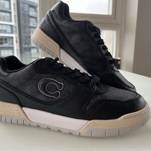 Coach SoHo Black Sneakers with Cushioned Sole and Modern Design. Runs small.